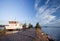 Small white pleasure boat moored on Saimaa lake