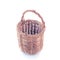 Small wicker basket on white background - vintage tone