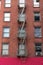 Small Window Fire Escape on a Brick Building in Tribeca New York