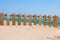 Small wood fence in sand on the coast