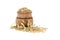 Small wooden barrel filled with oats grains with husk