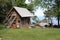 Small wooden bathhouse on the shore of the bay in Kepming. Latvia, June 2019