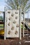 A small wooden climbing wall in a childrens playground