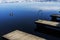 Small wooden docks above cold water in winter