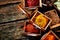 Small wooden drawers filled with assorted spices