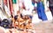 Small wooden dromedary camel at street market in Morocco - Travel shopping concept with manufactured handmade objects - Bright