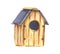 A small wooden handmade nesting box for a bird in garden.