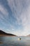 Small wooden rowboat moored in a Tromso fjord