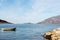 Small wooden rowboat moored in a Tromso fjord