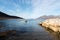 Small wooden rowboat moored in a Tromso fjord