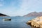 Small wooden rowboat moored in a Tromso fjord