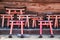 Small wooden torii gate with wishes written on them at Shinto shrine. Kyoto. Japan