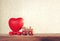 Small wooden toy locomotive carries heart, valentine`s day card