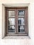 Small wooden window in historic building