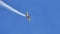 Small yellow airplane flies at 90 degrees performs aerobatics in slow motion