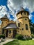 Small yellow Curwood Castle in Owosso, Michigan