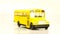 Small yellow machine cartoon school bus