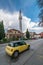 Small yellow private car in front of Mosque in Ohrid