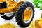 Small yellow tractor in exhibition, closeup details, wheels