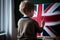 Small young boy painting the Union Jack