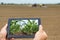 Smart agriculture. Farmer using tablet corn planting. Modern Agriculture concept.