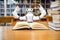 Smart AI robot are reading textbooks in the library