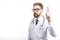 Smart Bearded Brown-haired Doctor Raising Index Finger