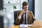 Smart businessman calling telephone at office table. Executive manager talking cell phone. handsome manager sitting at office