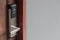 Smart card door key lock system in hotel. Hotel electronic lock on wooden door. Entrance door with electronic card lock security.