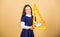 Smart and clever concept. Girl with big ruler. School student study geometry. Sizing and measuring. Kid school uniform