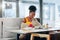 Smart diligent student getting ready for exam sitting in cafeteria