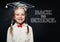 Smart educated school girl student in graduation hat