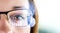 Smart glasses and augmented reality concept. Woman wearing moder spectacles.