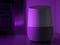 Smart home speaker assistant device in moody coloured LED lighting - Purple