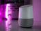 Smart home speaker assistant on fireplace with led coloured ambient lighting - Pink