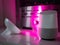 Smart home speaker device lit with colour changing LED lamp light - Pink