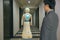 Smart hotel in hospitality industry 4.0 technology concept, robot butler robot assistant use for greet arriving guests, deliver cu