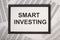 Smart investing concept. Word investment. Money and finance