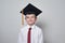 Smart little boy in graduation hat. Children education concept. Middle School, Junior High School