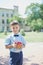 Smart little schoolboy in shirt and butterfly