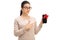 Smart looking woman showing a phone wrapped with red ribbon