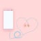 Smart phone pink color and earphones pink color heart shape