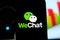 Smart phone with the WeChat logo.  WeChat is a mobile text messaging service and voice message