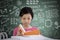 Smart schoolgirl is preparing school exams