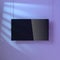 Smart TV glass panel Mockup hanging on the wall by ropes