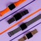 Smart watches with different straps on colorful background