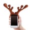 Smartphon christmas funny concept, reindeer antlers toy, Isolated on white