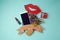 Smartphone with cardboard banner, lipstick and gift box. Creative website hero image.