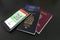 Smartphone with digital health passport app with three passports for travel covid-19 pandemic