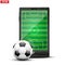 Smartphone with football ball and field on the